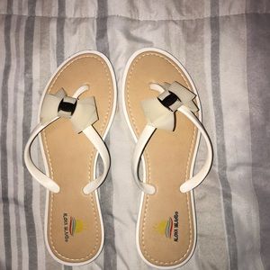 White sandals with bow